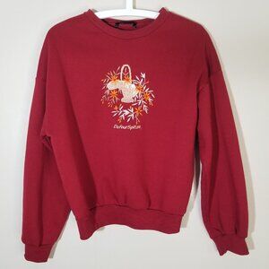 Shein crewneck sweatshirt with an embroidered floral basket design; Size: Small.